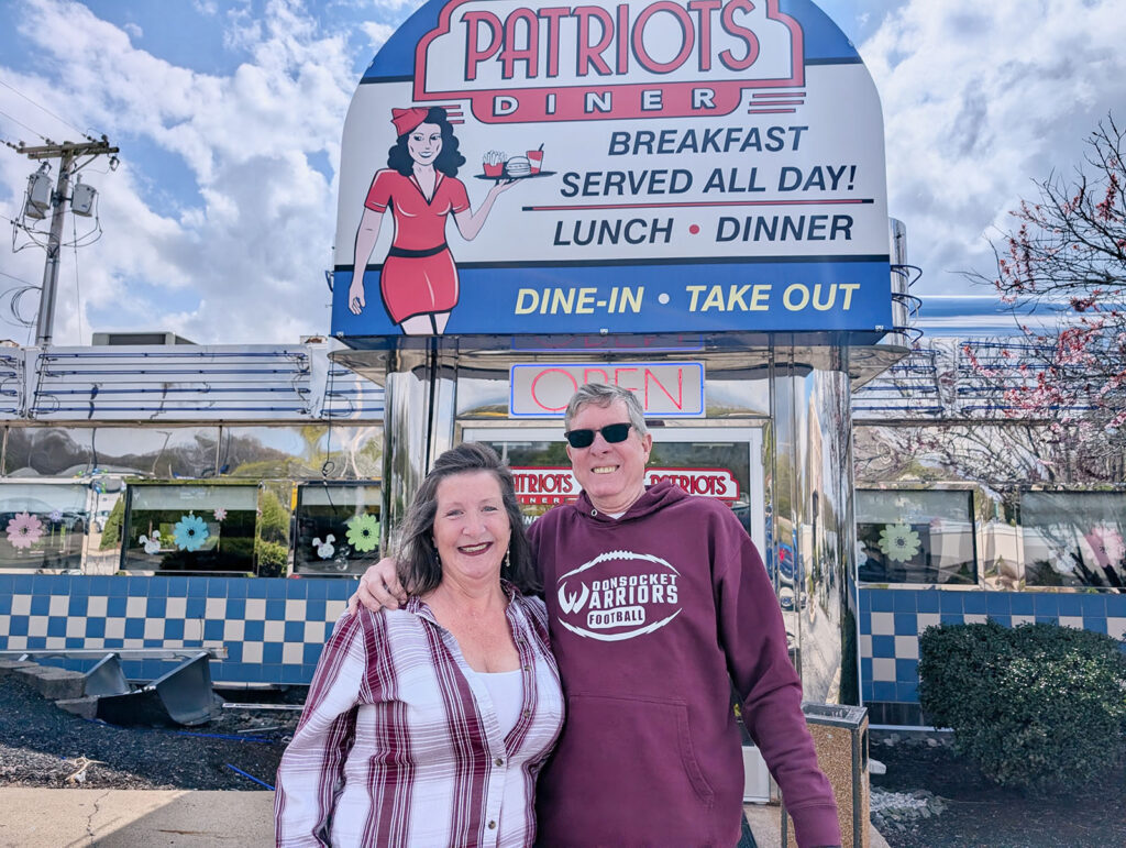Sandy Boucher and Marc Berthelette stand outside of Patriots Diner in Woonsocket. Insider photos by Ethan Shorey.