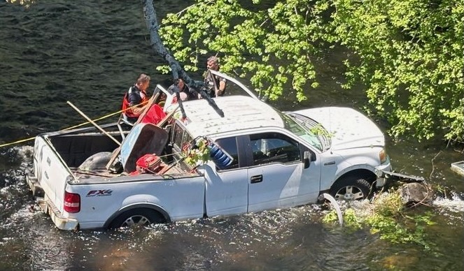 The truck in the water.