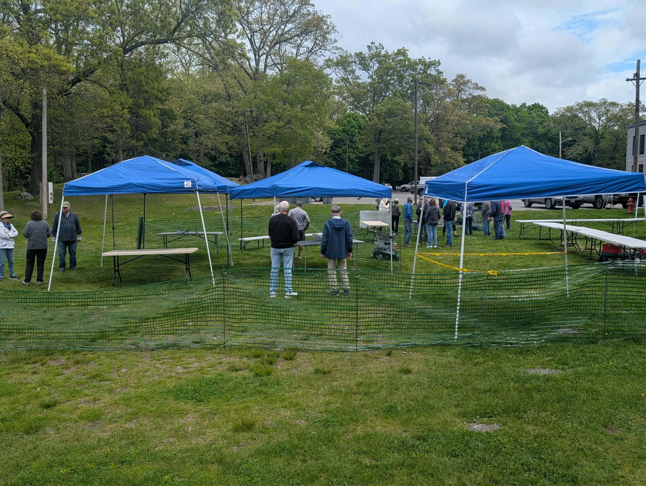 Volunteers set up for Saturday's sale in record time Friday afternoon.