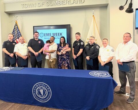 Local responders with the family they helped.