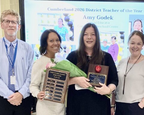 At Amy Godek's May 14 recognition are, from left, Supt. Phil Thornton, Cumberland Preschool Center Principal Rachel Powell, Godek, and School Committee Chairperson Amy Vogel. (Insider photo by Ethan Shorey)