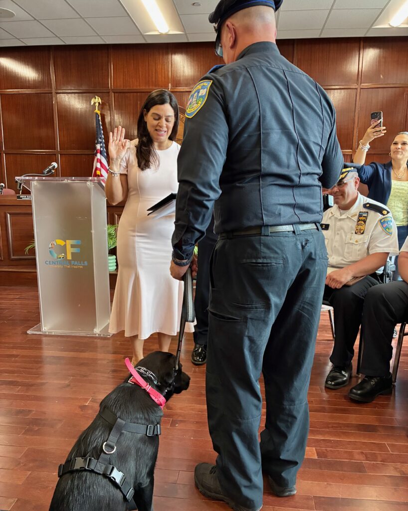 Hope is sworn in alongside her officer.