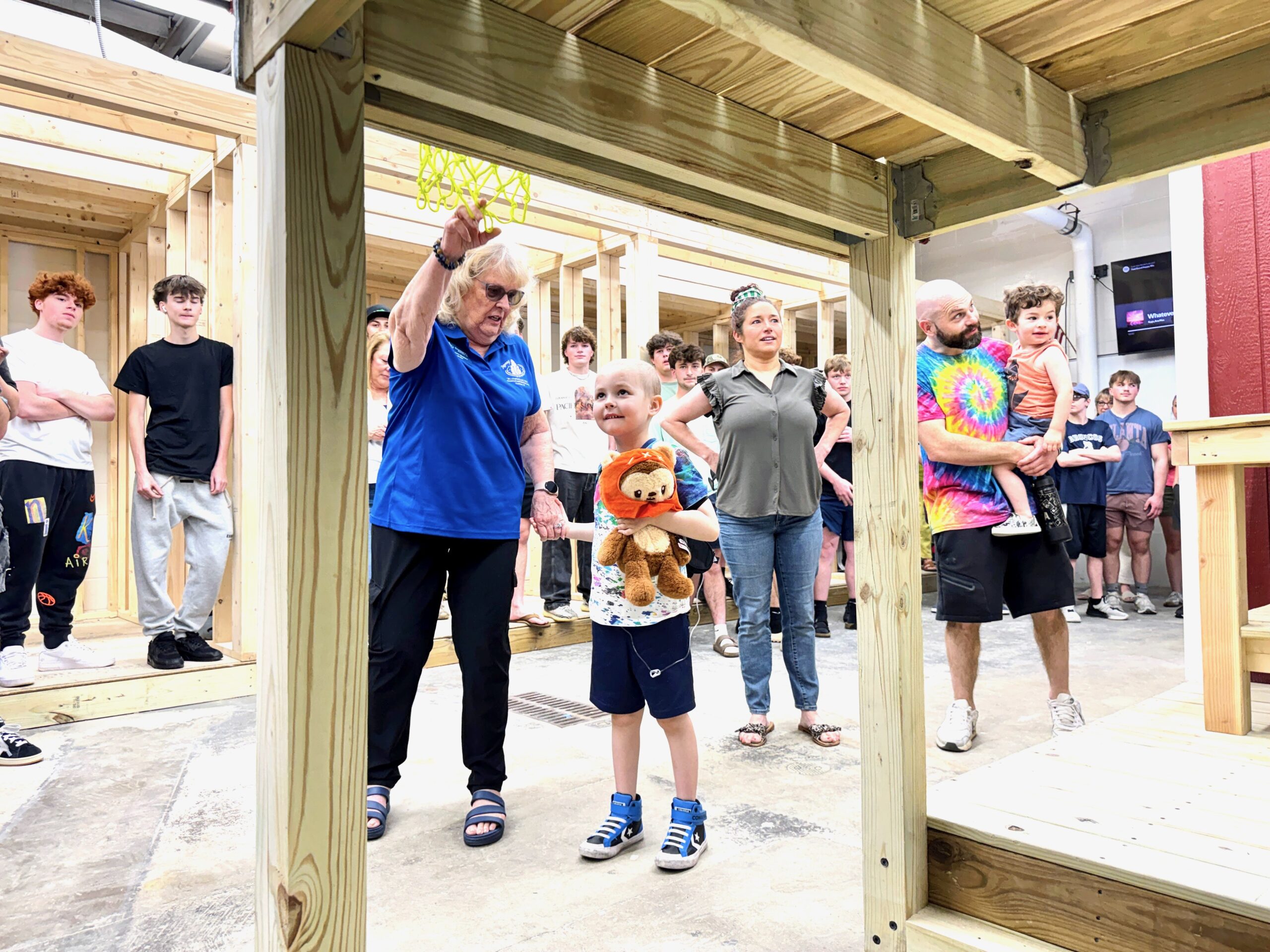 Luca Brazil-Sheehan sees the new playhouse built by BHS students.