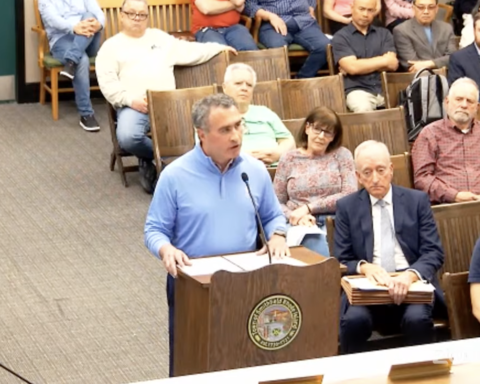 Greg Heflin speaks at Tuesday's meeting