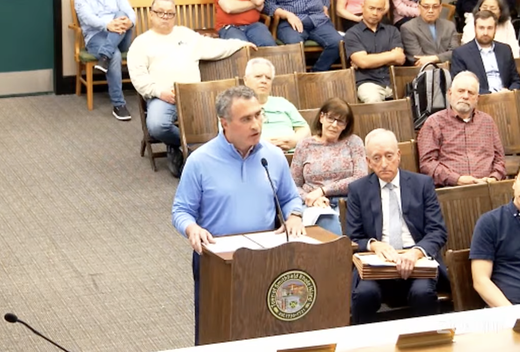 Greg Heflin speaks at Tuesday's meeting