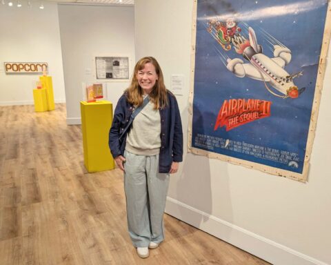 Jennifer Keating poses in the Attleboro Arts Museum space where the Union Theatre was highlighted. Insider photos by Ethan Shorey.