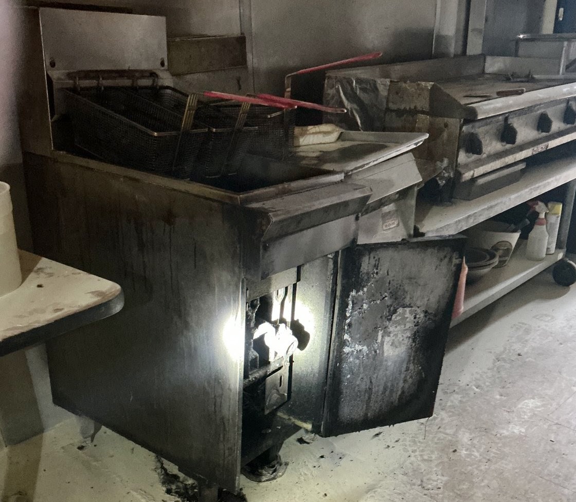 The fire was confined to the area of the fryer.