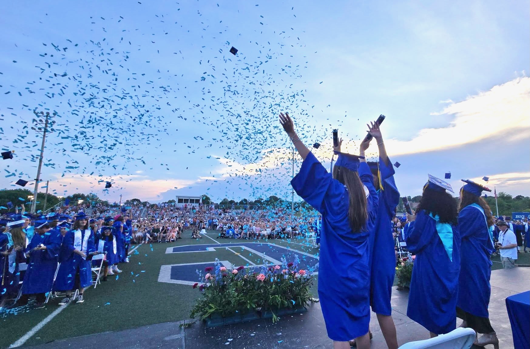 Cumberland High School graduates celebrate their achievement on Friday evening at Tucker Field.