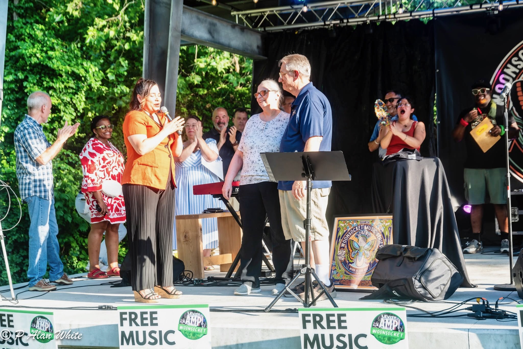 Valerie Gonzalez presents Dave Richards with his honor Friday evening. (photos by Paul Alan White)