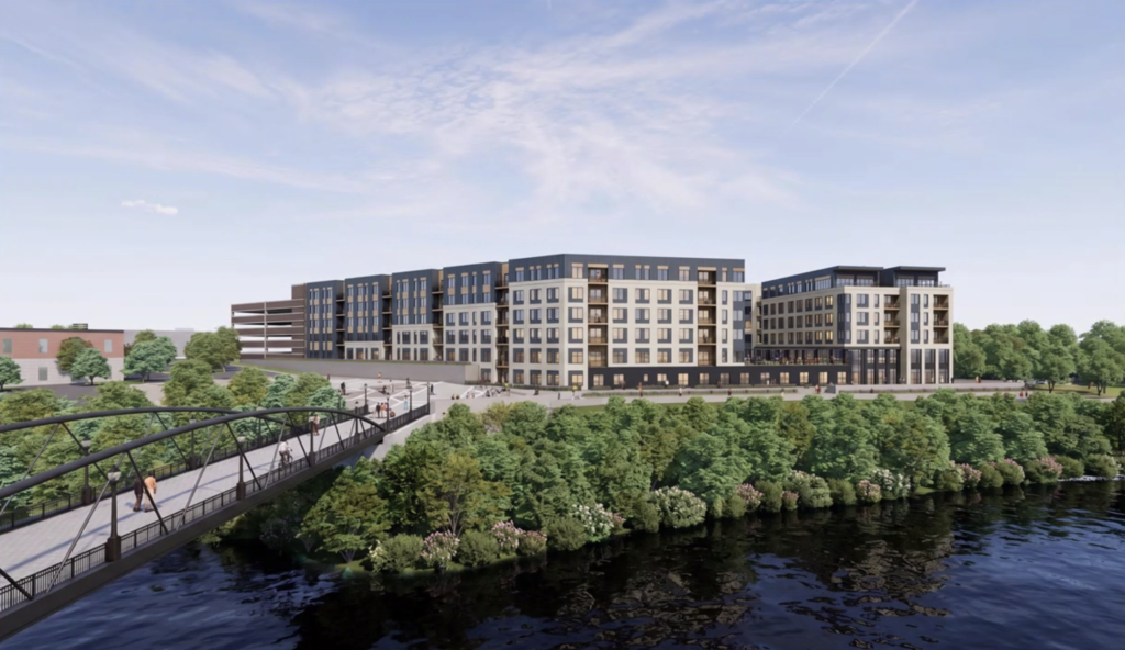 The rendering view of the pedestrian bridge and residential complex at Tidewater Landing.