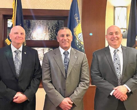 From left, Deputy Chief Michael Chalek, Assistant Vice President of Public Safety and Chief of Police Michael Jagoda, and Deputy Chief of Police Paul Ricci have all graduated from the FBI National Academy.