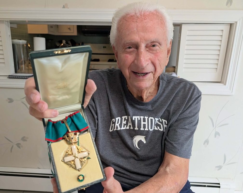 G. Richard Fossa with the special recognition given to him by the Italian president.