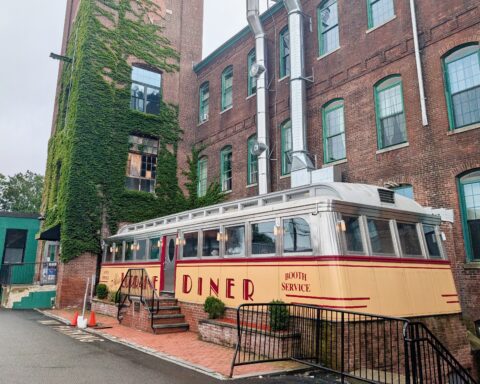 The Lorraine Mills, at 560 Mineral Spring Ave., are easily recognizable by the old dining car that Jonathan Savage transformed into the Miss Lorraine Diner, which is now nearly always busy. (photo by Ethan Shorey)