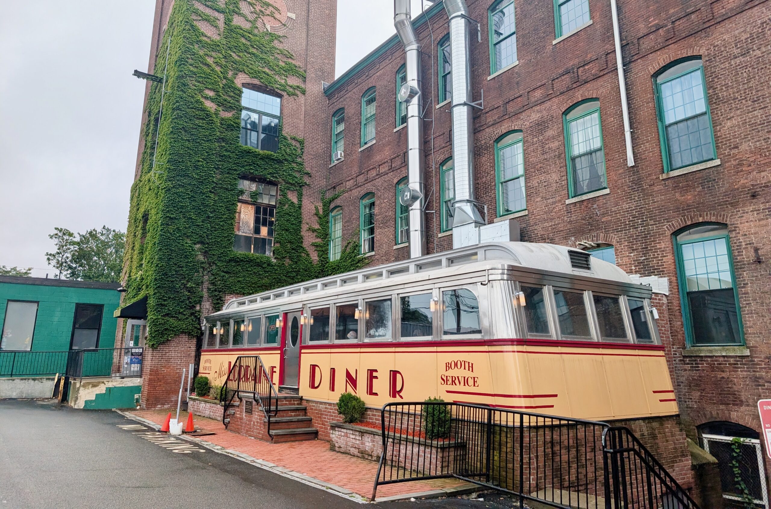 The Lorraine Mills, at 560 Mineral Spring Ave., are easily recognizable by the old dining car that Jonathan Savage transformed into the Miss Lorraine Diner, which is now nearly always busy. (photo by Ethan Shorey)
