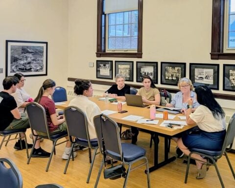 Committee members meet on July 13.