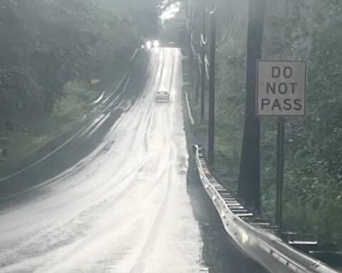 Wet roads show plenty of evidence of passing motorists on Route 7, as shown by John Beauregard in this picture.