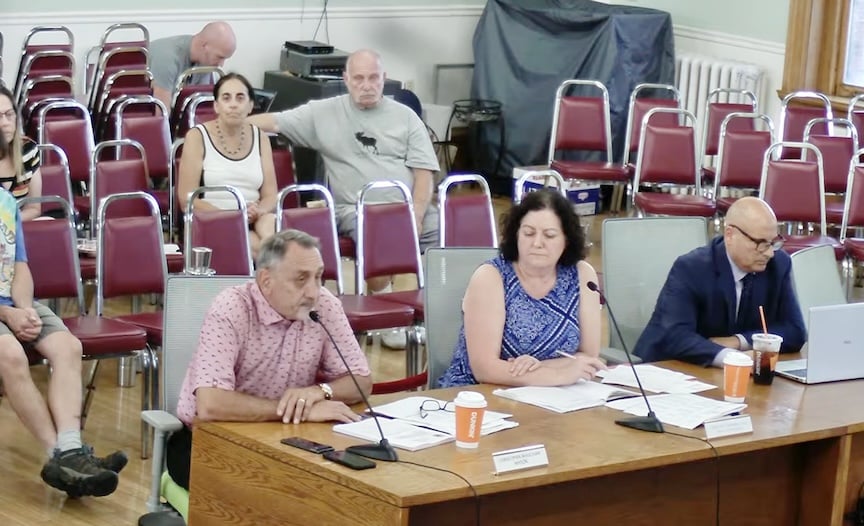 From left, Mayor Chris Beauchamp, Interim Finance Director Christine Chamberland, and City Solicitor Michael Lepizzera answer questions on Aug. 24.