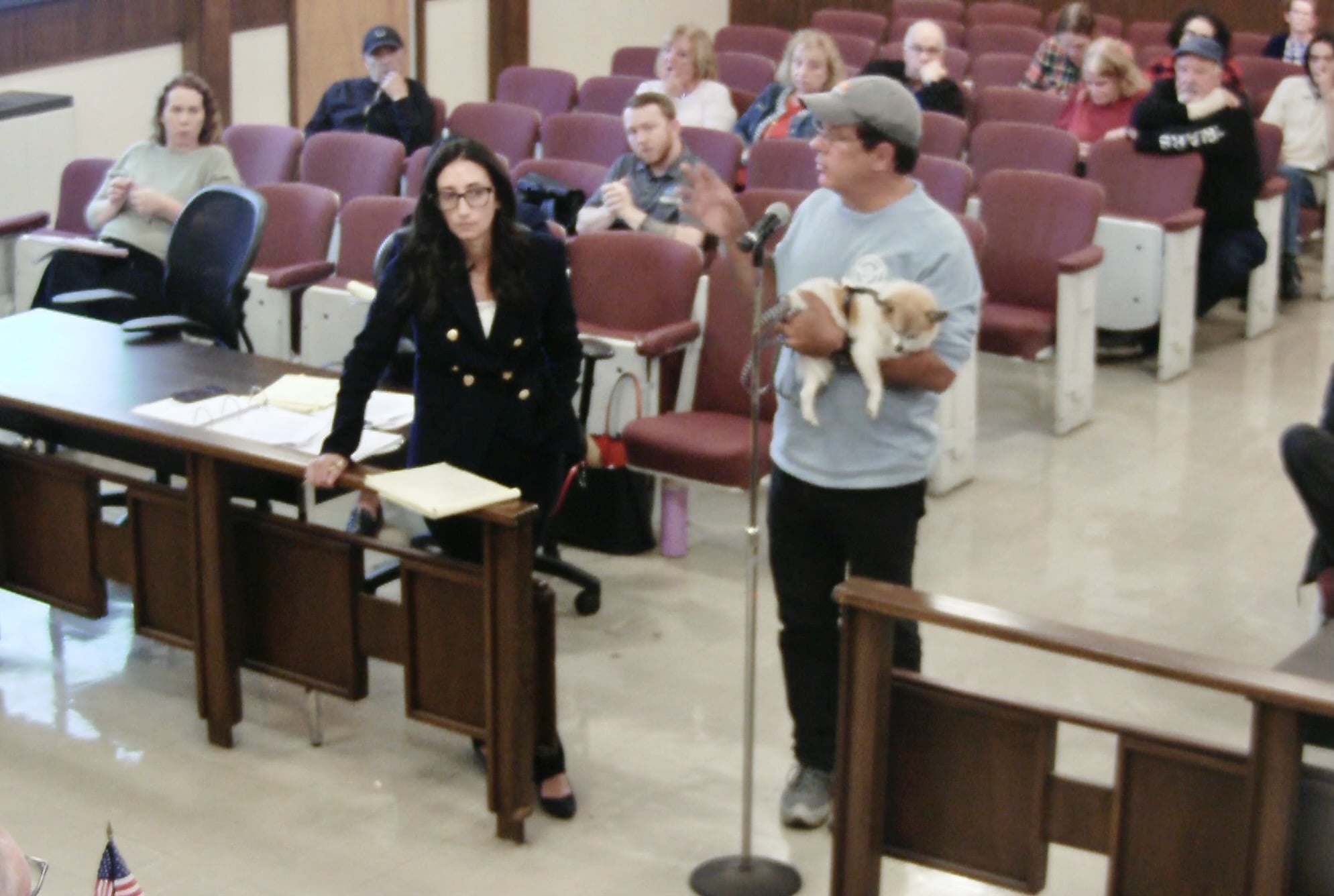 Puppy on his arm and attorney Joelle Rocha by his side, developer John Somyk explains his reasoning for the project he proposed in Lincoln.