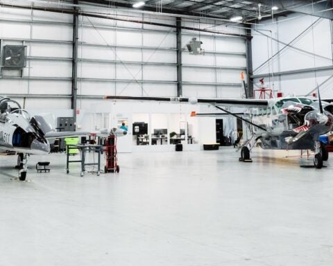 Merlin's Cessna 208 Caravan and L-39 Albatros at the North Central State Airport hangar.